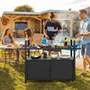 Outdoor wicker buffet serving cart in black with glass top, featuring storage shelves and hooks, ideal for BBQ parties.