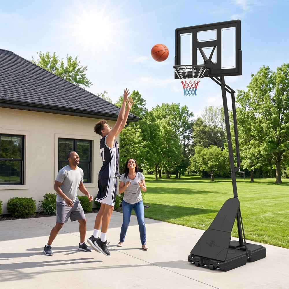 Height adjustable basketball goal system with shatterproof backboard, set at 10 ft for outdoor play and stability.