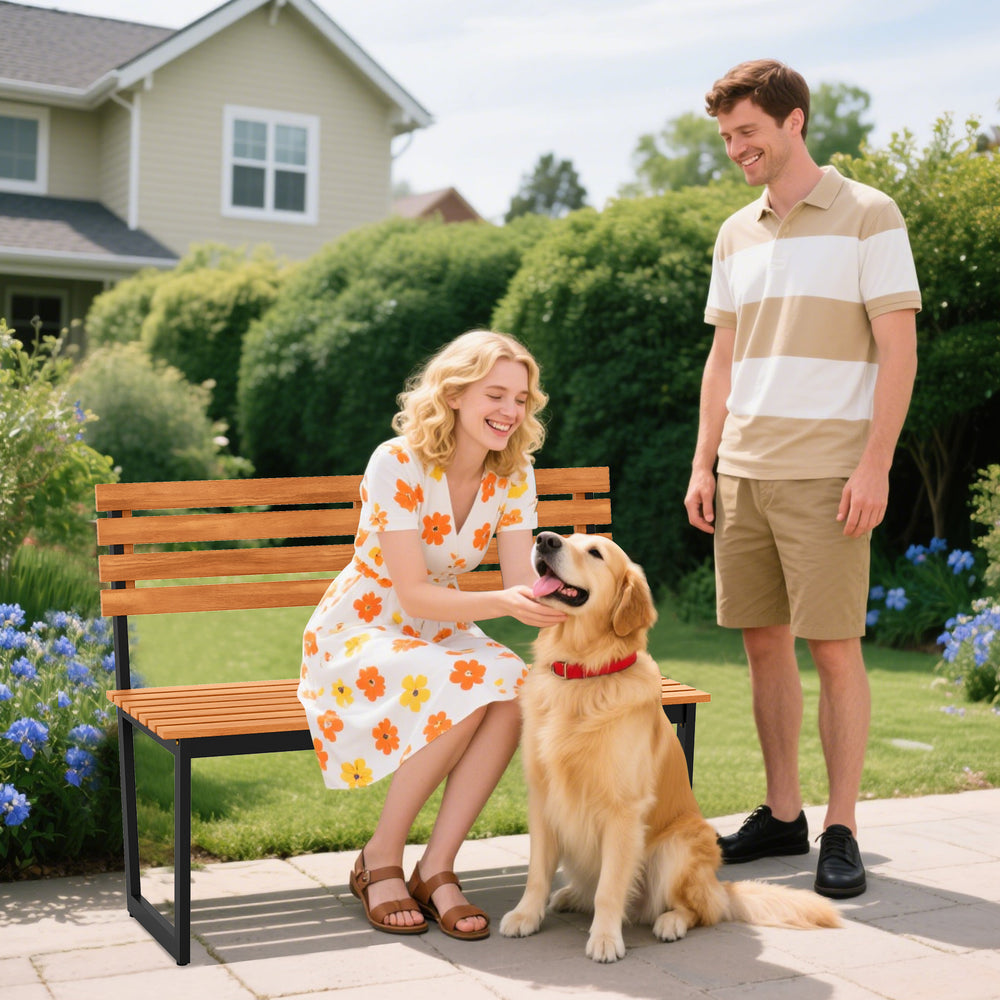Outdoor acacia wood patio loveseat with backrest, featuring a sturdy metal frame, ideal for garden relaxation.