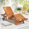 Side view of the outdoor chaise lounge chair with wheels, showcasing its rustic wood grain and ergonomic reclining.