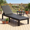 Black outdoor chaise lounger chair with waterproof rattan textured surface, adjustable backrest, perfect for sunbathing.