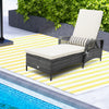 Outdoor chaise lounge chair recliner in gray PE rattan with cream cushion, perfect for poolside relaxation.