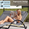 Outdoor dual rocker sunbed with gray fabric, ergonomic design, and detachable headrests for backyard relaxation.
