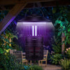 Hanging outdoor fly trap with light, featuring UV bug attraction and rechargeable battery for patios and camping use.