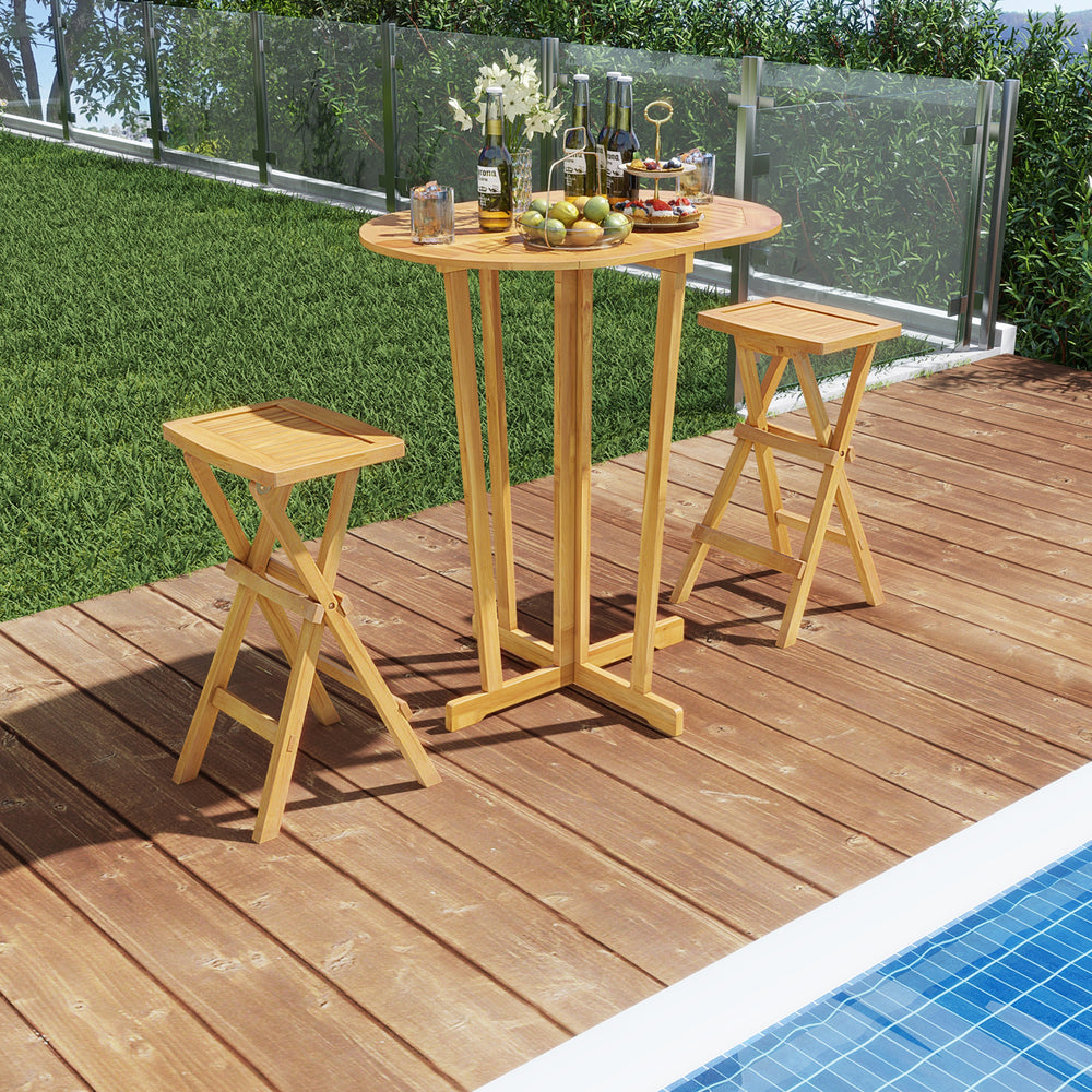 Outdoor folding bar table with oval teak wood tabletop and cross base, perfect for small dining areas and outdoor use.