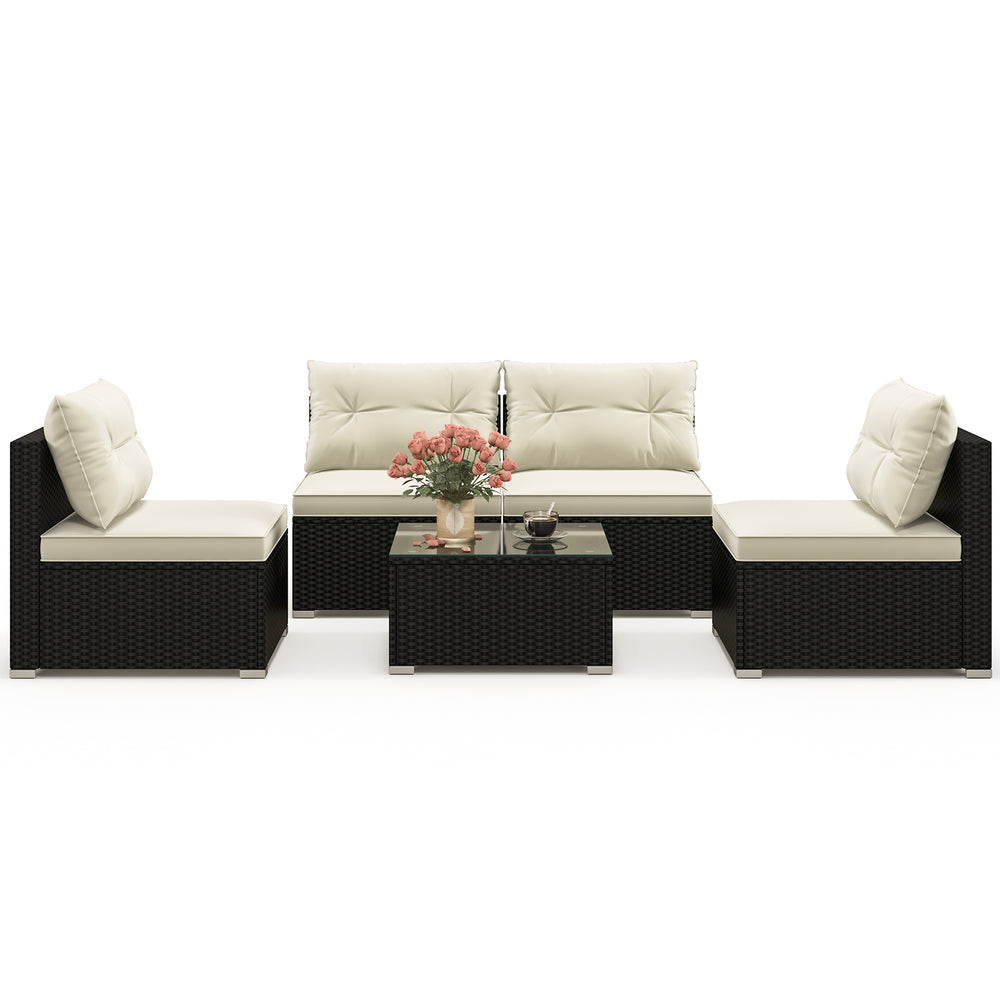 5-piece outdoor patio furniture set featuring black PE wicker, soft cushions, and a coffee table, ideal for garden.