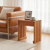 Single person patio backless bench in natural wood grain, perfect as a side table or plant stand for small spaces.