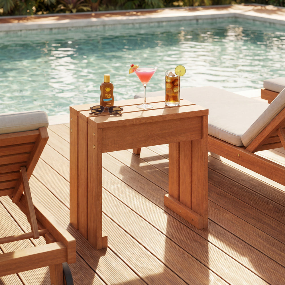 Single-person outdoor garden bench in natural wood grain, ideal as a side table or plant stand by the poolside.