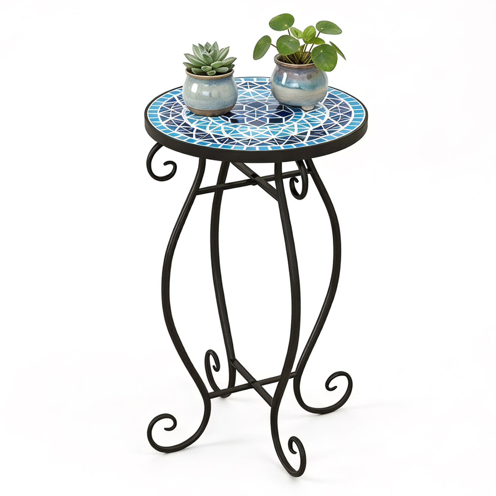 Round accent plant stand with cobalt blue mosaic top and black steel frame, perfect for indoor or outdoor use.