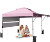 Outdoor instant pop-up canopy tent in pink with dual side awnings, ideal for beach picnics and sun protection.