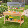 Wooden outdoor mud kitchen for kids featuring a sink, faucet, and storage shelves for imaginative play and organization.