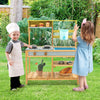 Outdoor kids mud kitchen with faucet, featuring a stove top, removable sink, and storage shelves for imaginative play.
