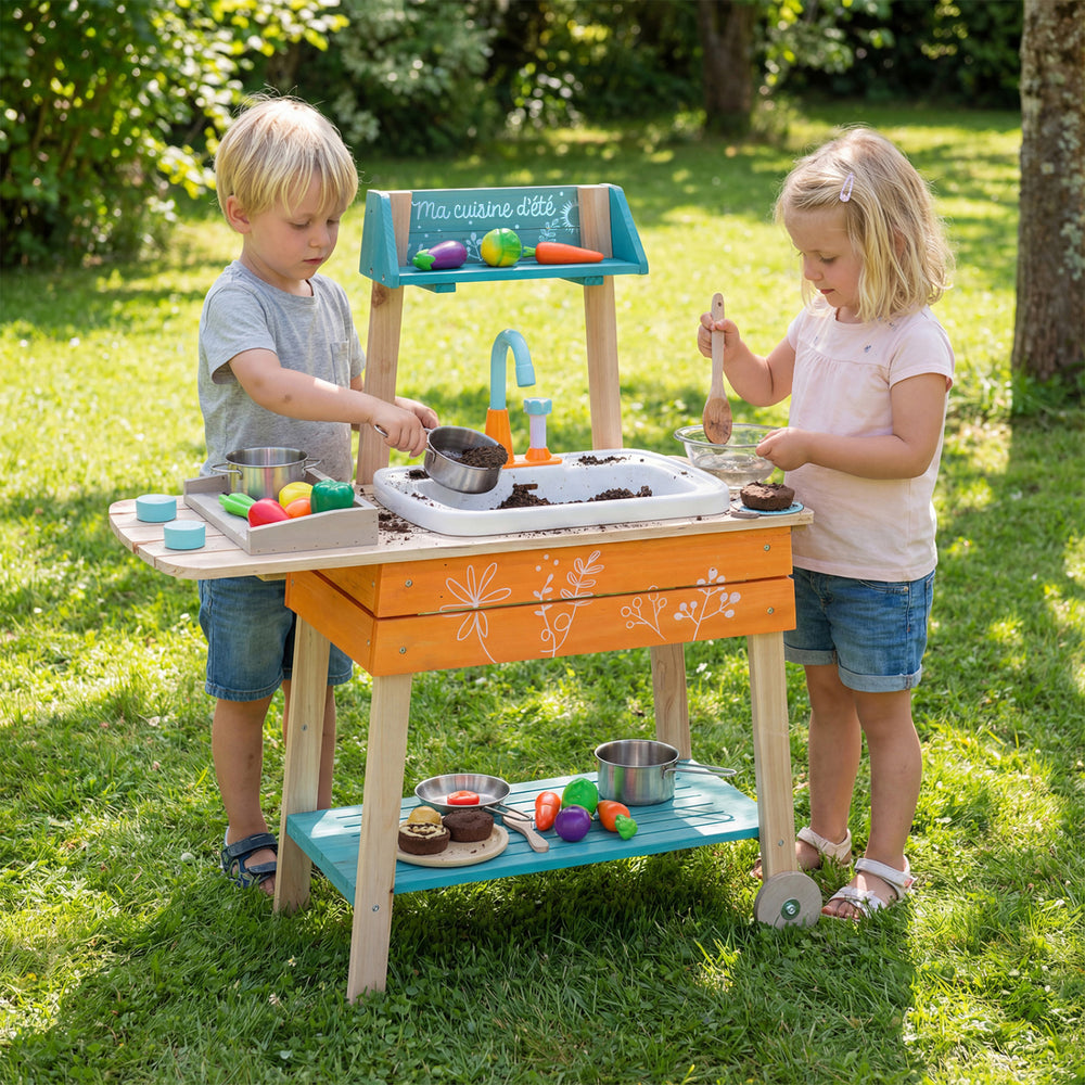 Children playing with the Outdoor Kids Play Kitchen Set, featuring a removable sink and vibrant orange design.