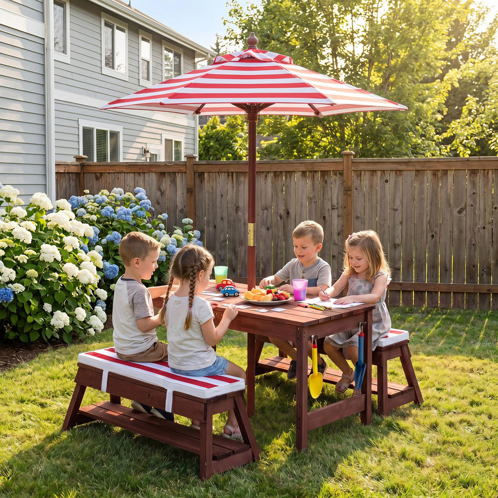 Kids enjoy playtime at the Outdoor Kids Wooden Picnic Table and Benches Set with Umbrella in a sunny backyard setting.