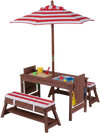 Outdoor kids wooden picnic table set with red striped umbrella, featuring lift-off tabletops and cushioned benches for comfort.