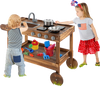 Outdoor movable mud kitchen with sink, stove, and wheels, perfect for kids' imaginative play in the garden.
