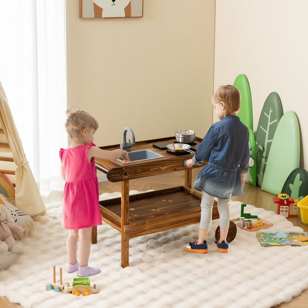 Outdoor movable mud kitchen with sink and stoves, made of fir wood, perfect for kids' imaginative play in the backyard.
