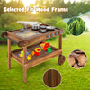 Outdoor movable mud kitchen made of fir wood with sink, stove, and wheels for kids' imaginative play in the backyard.