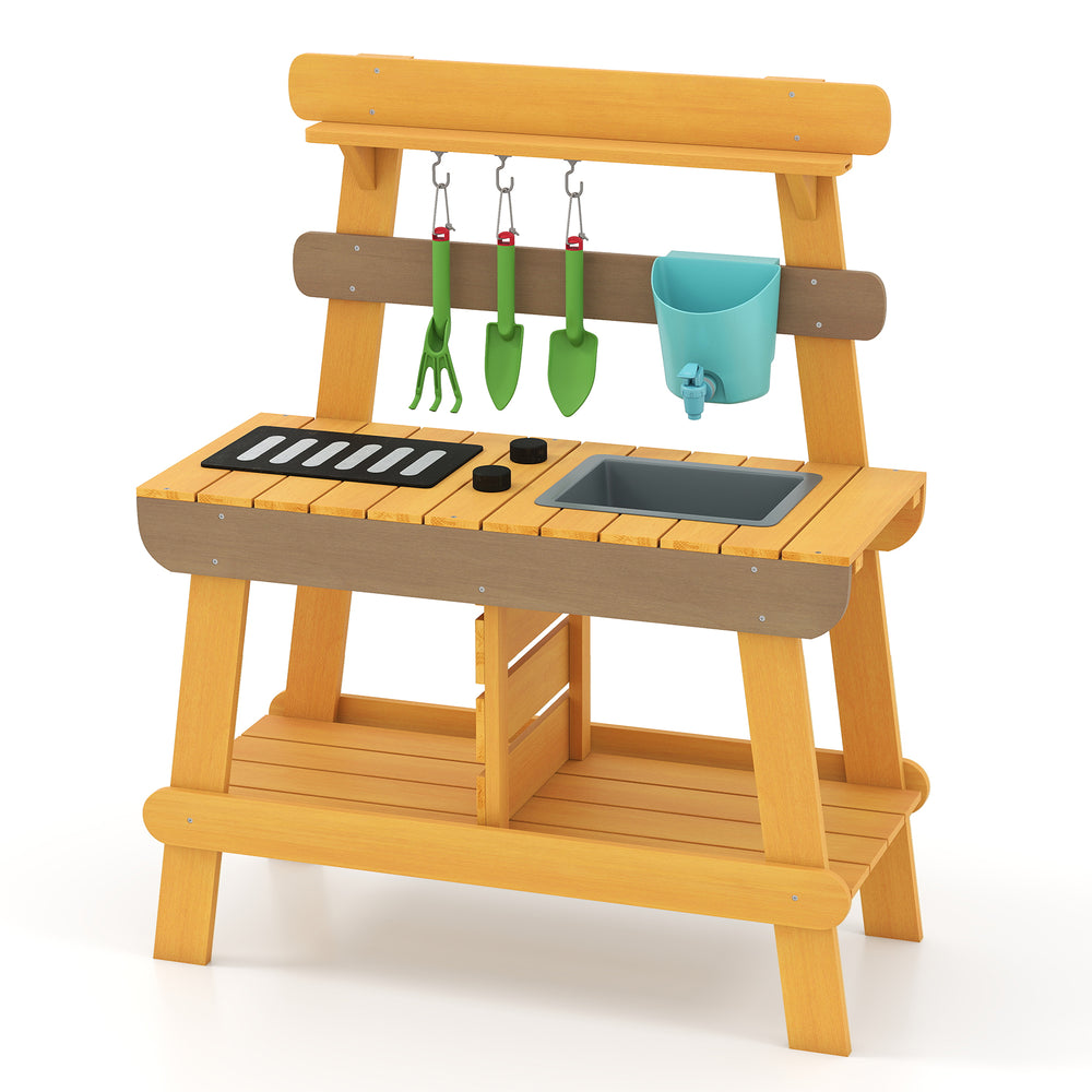 Wooden outdoor mud kitchen for kids with grill rack, sink, and gardening tools, perfect for imaginative play.