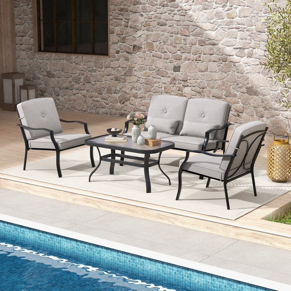 4-piece outdoor conversation set with gray cushions, featuring a tempered glass table, ideal for poolside relaxation.