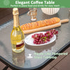 Ripple-like tempered glass coffee table with food and drinks, part of a 4-piece outdoor conversation set in gray.