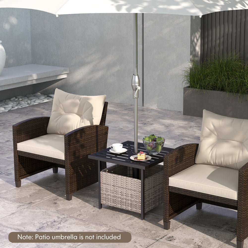 Gray outdoor patio side deck table made of rattan wicker and steel, featuring an umbrella hole and storage underneath.