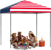 Outdoor pop-up canopy tent with American flag design, providing UPF 50+ sun protection for beach gatherings and picnics.