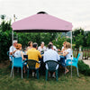 Pink outdoor pop-up canopy tent, 6.6' x 6.6', height adjustable, providing shade for gatherings and events.
