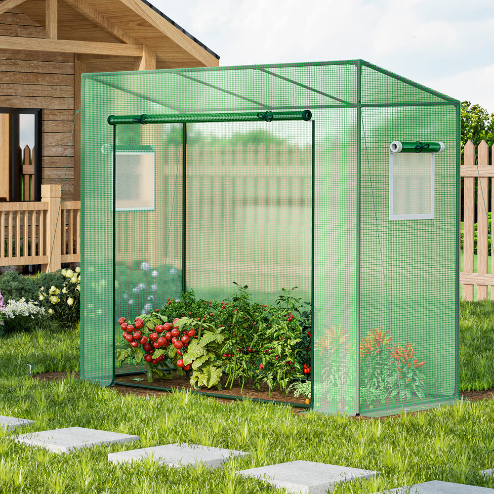 Exterior view of the outdoor portable greenhouse showcasing its spacious design, ideal for year-round plant cultivation.