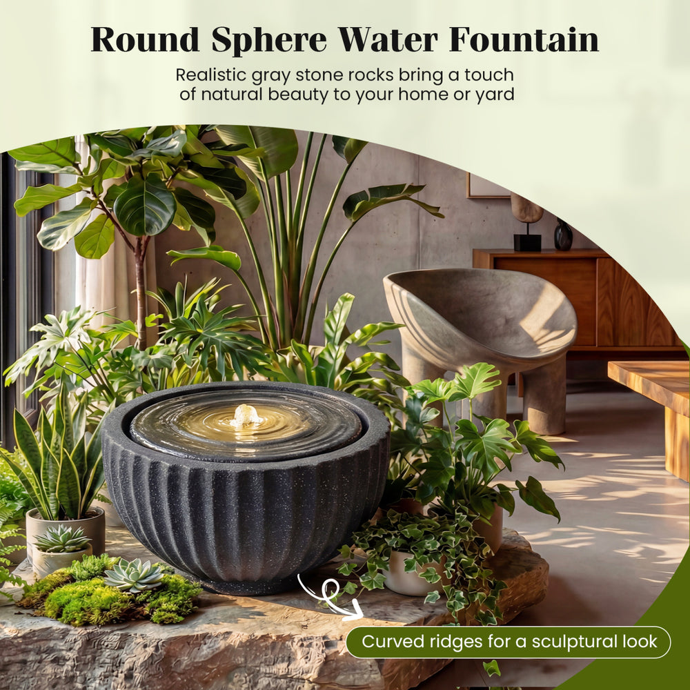 Round sphere water fountain with LED lights, featuring a realistic stone look and curved ridges for outdoor tranquility.