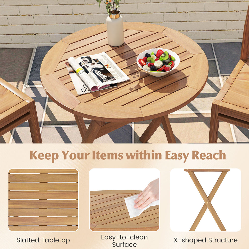 Round outdoor side table featuring a slatted tabletop and X-shaped structure, made of durable acacia wood for versatile.