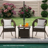 Brown all-weather PE wicker patio side table with umbrella hole, ideal for outdoor spaces like gardens and poolside.