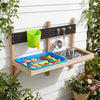 Outdoor wall-mounted mud kitchen for kids with sink, stovetop, and water faucet for imaginative play and outdoor fun.