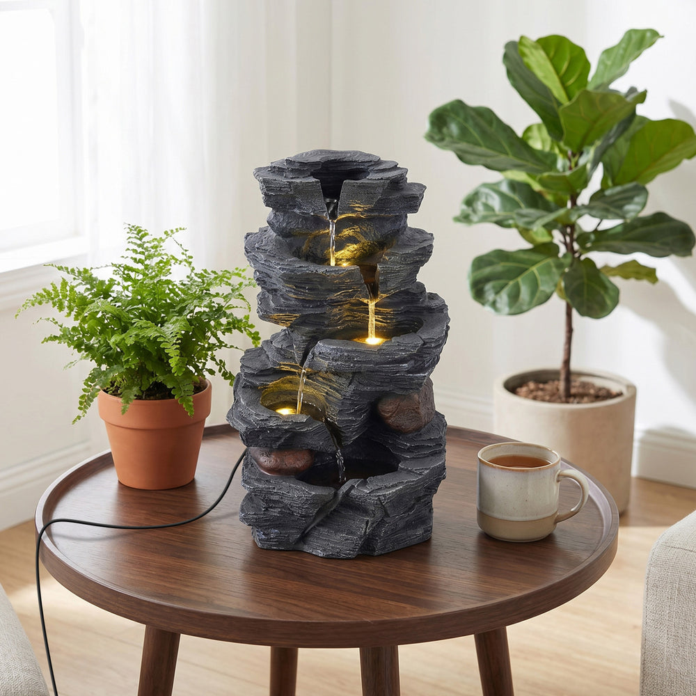5-tier tabletop water fountain with LED lights, realistic stone gray finish, creates calming ambiance for indoor.