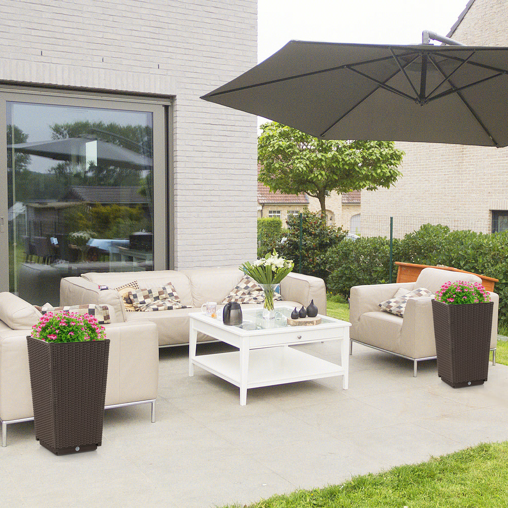 Brown wicker flower pots set of 2 with drainage holes, perfect for enhancing outdoor decor and plant cultivation.