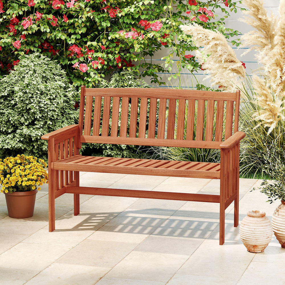 Outdoor wood garden bench for 2 people with slatted seat and armrests, ideal for patio or garden relaxation.