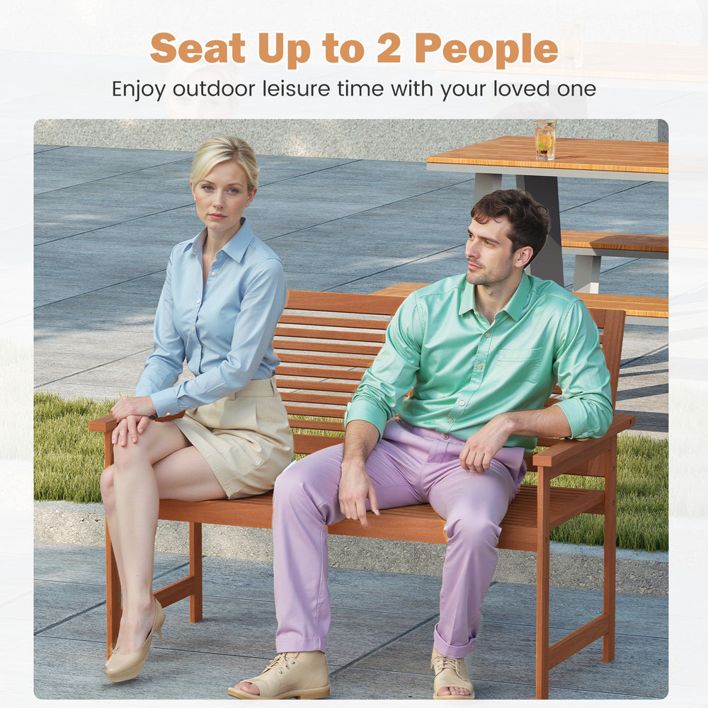 Two-person outdoor wooden bench with slatted backrest, ideal for patio relaxation and comfort.