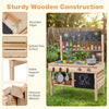 Outdoor mud kitchen for kids featuring wooden construction, blackboards, and ample storage for imaginative play.