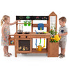 Outdoor wooden mud kitchen with planter box and sink for toddlers, featuring storage shelves and a blackboard for creative play.