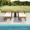 Patio acacia wood armchairs with cushions and ottoman, ideal for poolside relaxation and outdoor comfort.