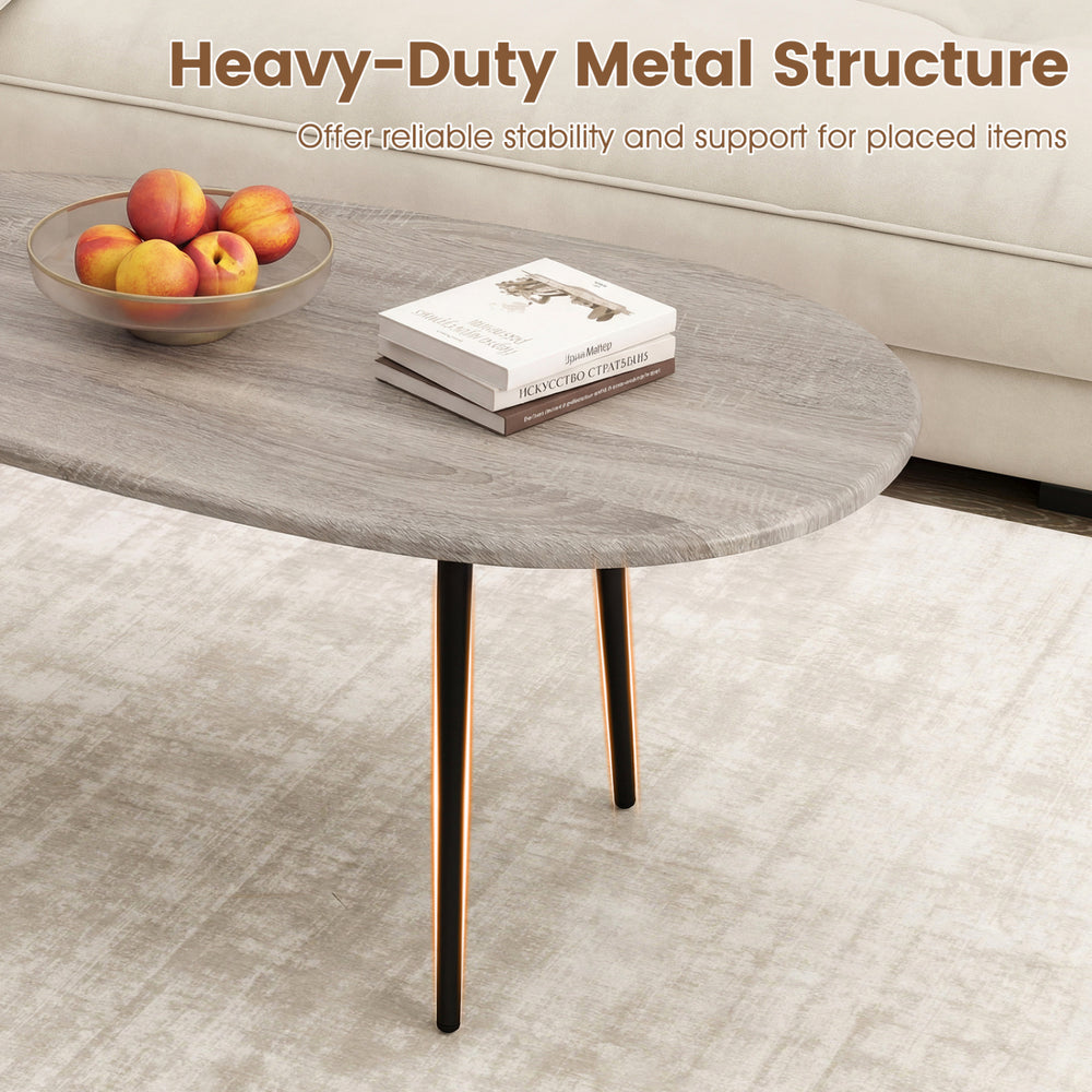 Oval coffee table with sturdy metal construction in gray, featuring rounded edges and adjustable foot pads for.