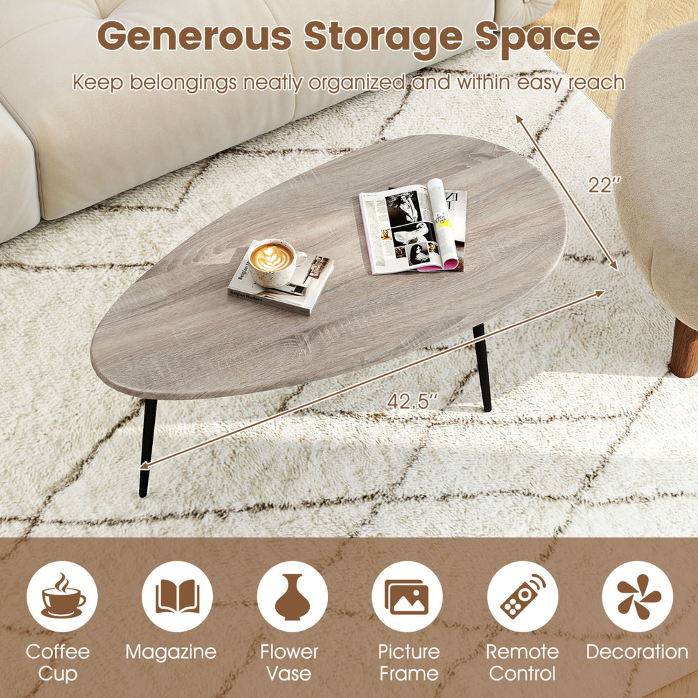 Oval coffee table with sturdy metal construction in gray, featuring generous storage space for magazines and decor.