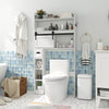 Over the toilet storage cabinet in white with sliding barn door and adjustable shelves for organized bathroom space.