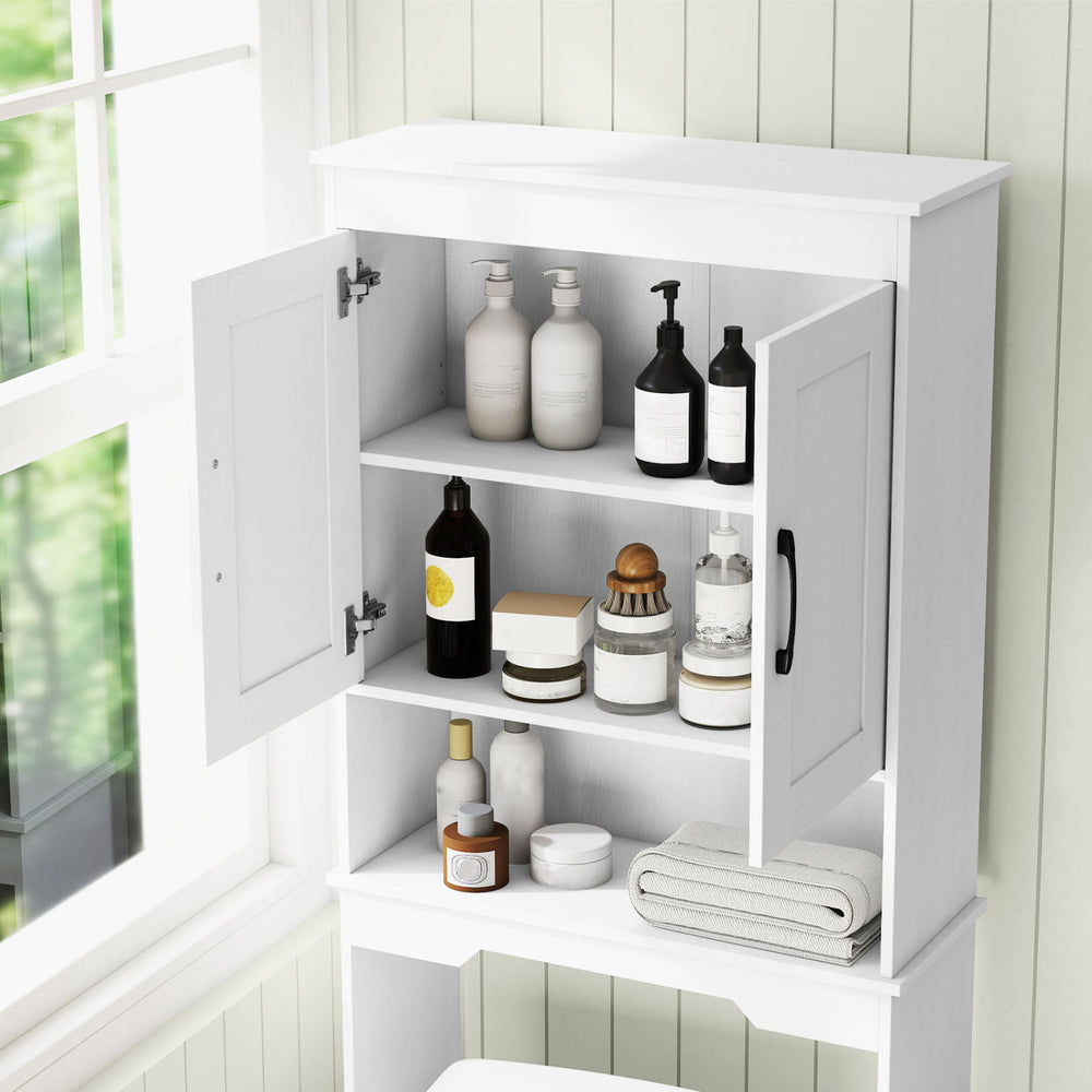 Over toilet bathroom organizer with open compartment and cabinet, featuring adjustable shelf and sleek white finish.
