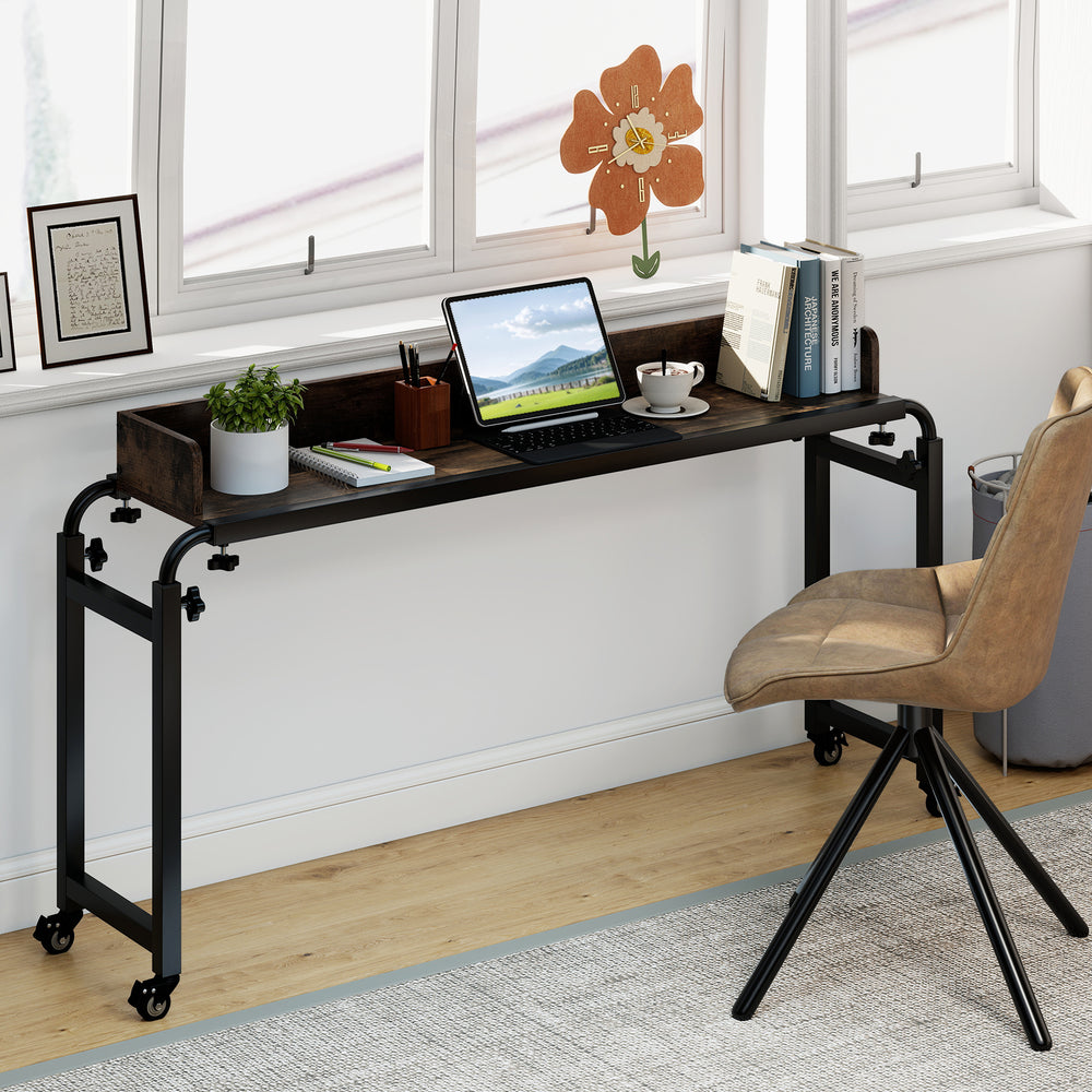 Overbed desk with wheels in brown, featuring adjustable height and a large tabletop for versatile use by the bed.