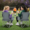 Two friends enjoying drinks in gray oversized camping chairs with cup holders, perfect for outdoor events and.