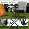 Oversized gray camping chair with integrated side table, cup holder, and storage pockets for outdoor convenience.
