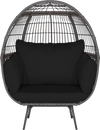 Oversized indoor wicker egg chair with sturdy metal frame and black cushions, perfect for cozy relaxation in any space.