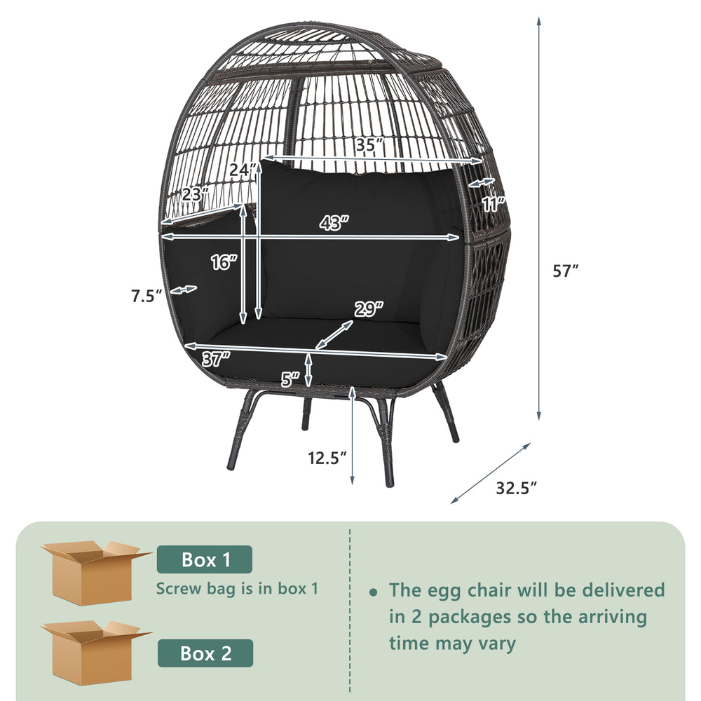 Oversized black wicker egg chair with sturdy metal frame and thick cushion, ideal for cozy indoor or patio relaxation.