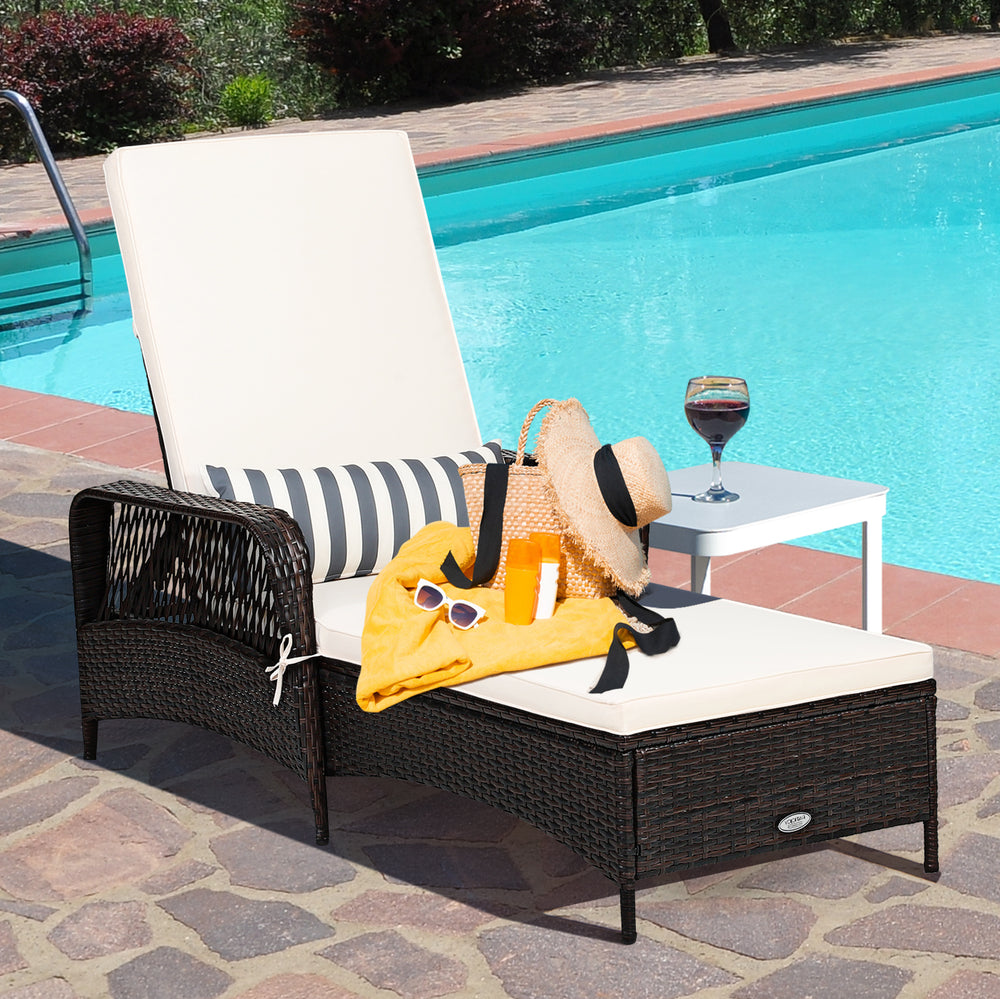 Adjustable PE rattan chaise lounge chair with cream cushion and lumbar pillow, perfect for poolside relaxation.